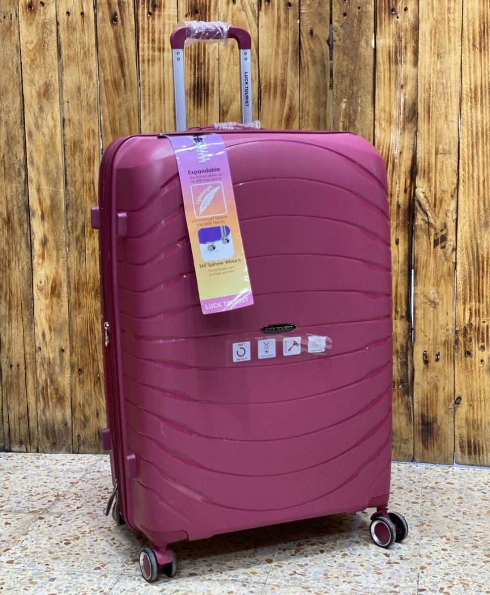 Valise rigide spacieuse 4 roues