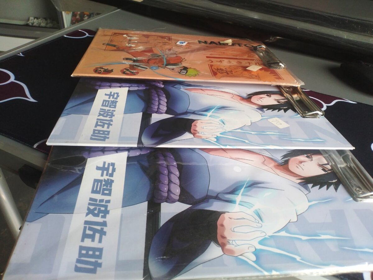Naruto and Sasuke themed clipboard