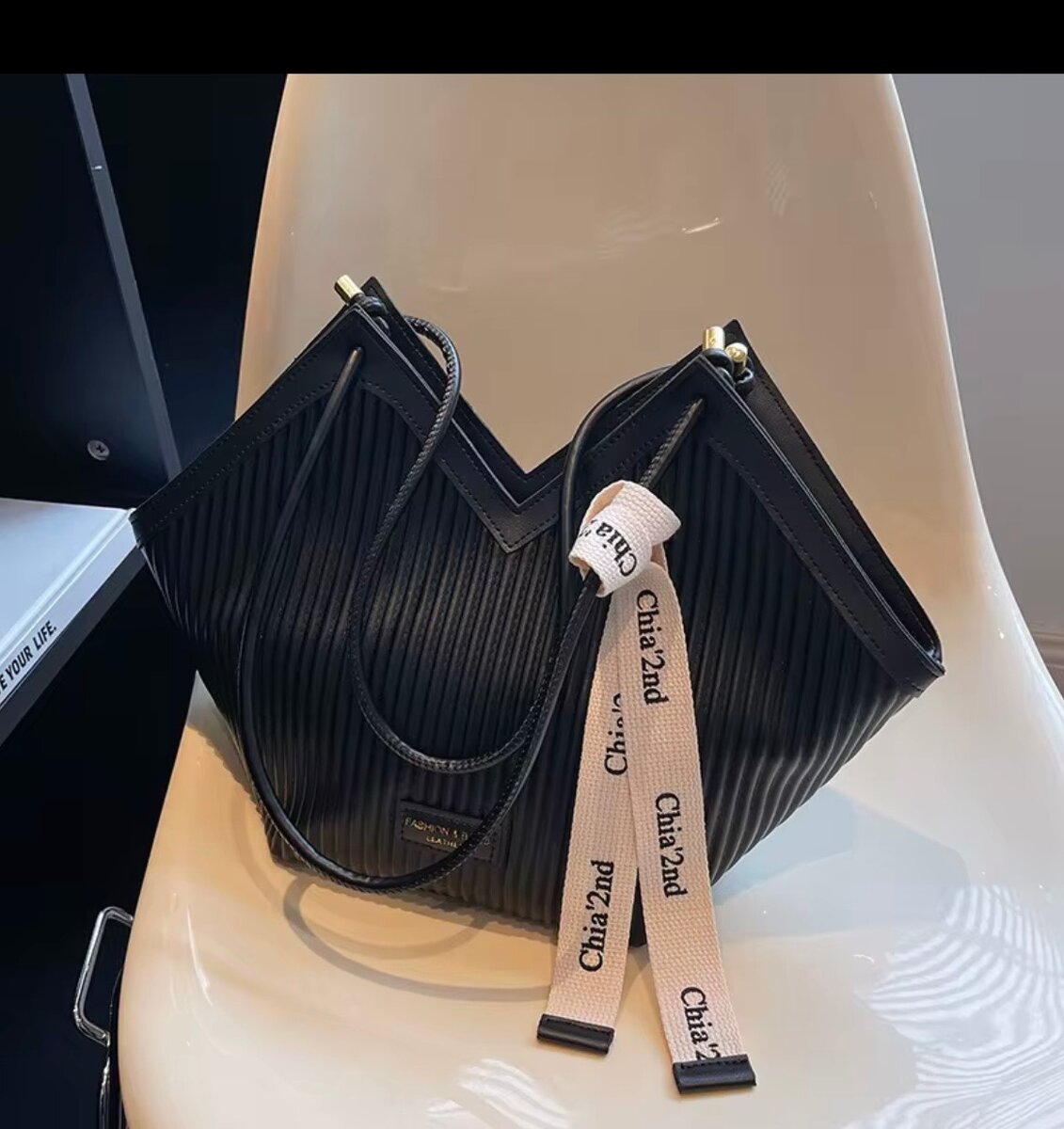 Sac à main en cuir plissé