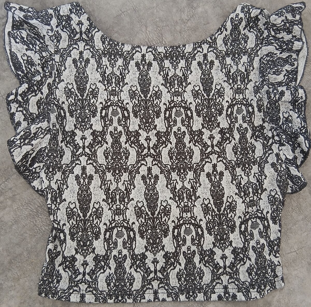 Haut en dentelle fleurie noir