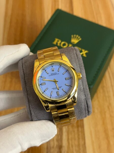 Montre Rolex Dorée Élégante