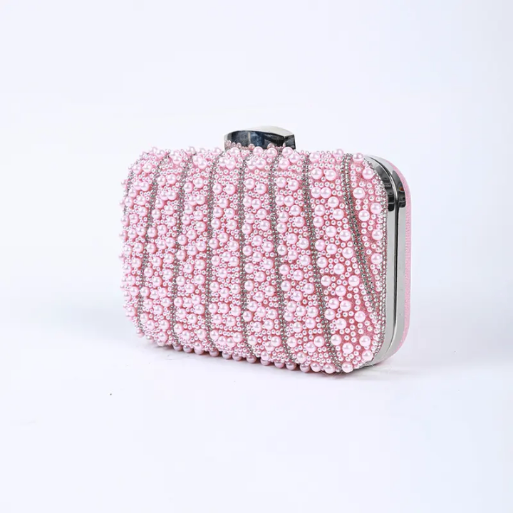 Clutch élégant perlé rose