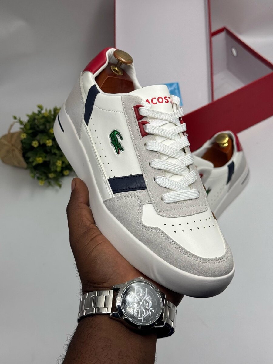 LACOSTE NAVY AND WHITE