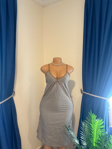 Dotted dress in Uk 8-12 with slits at both sides