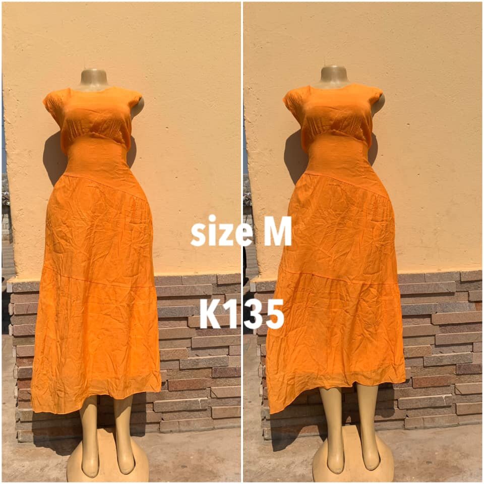 Orange dress, asymmetrical cut, size M