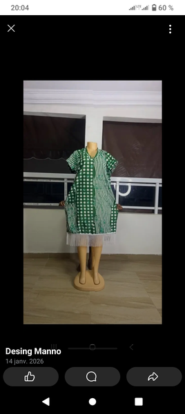 Robe africaine verte à motifs blancs