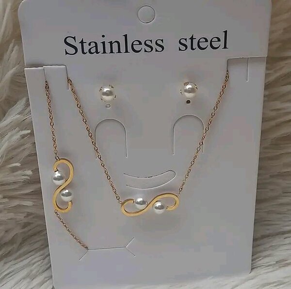 Élégant set bijoux papillon acier