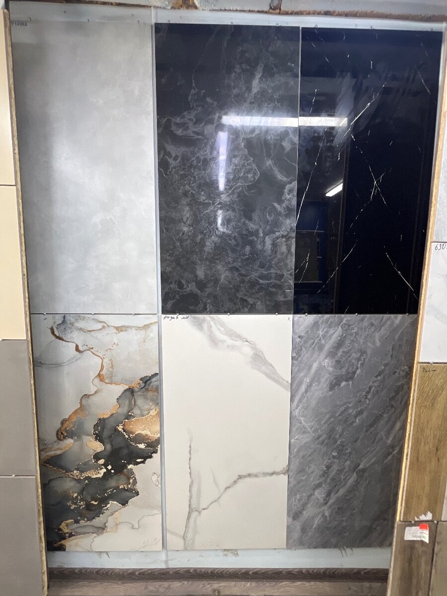 Кафель керамогранид размер от 300X300 до 1200X600. Цены разн