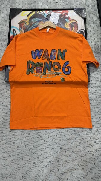 T-shirt orange graphique unisexe