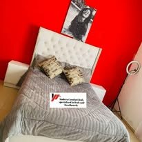 custom made bed with a high base