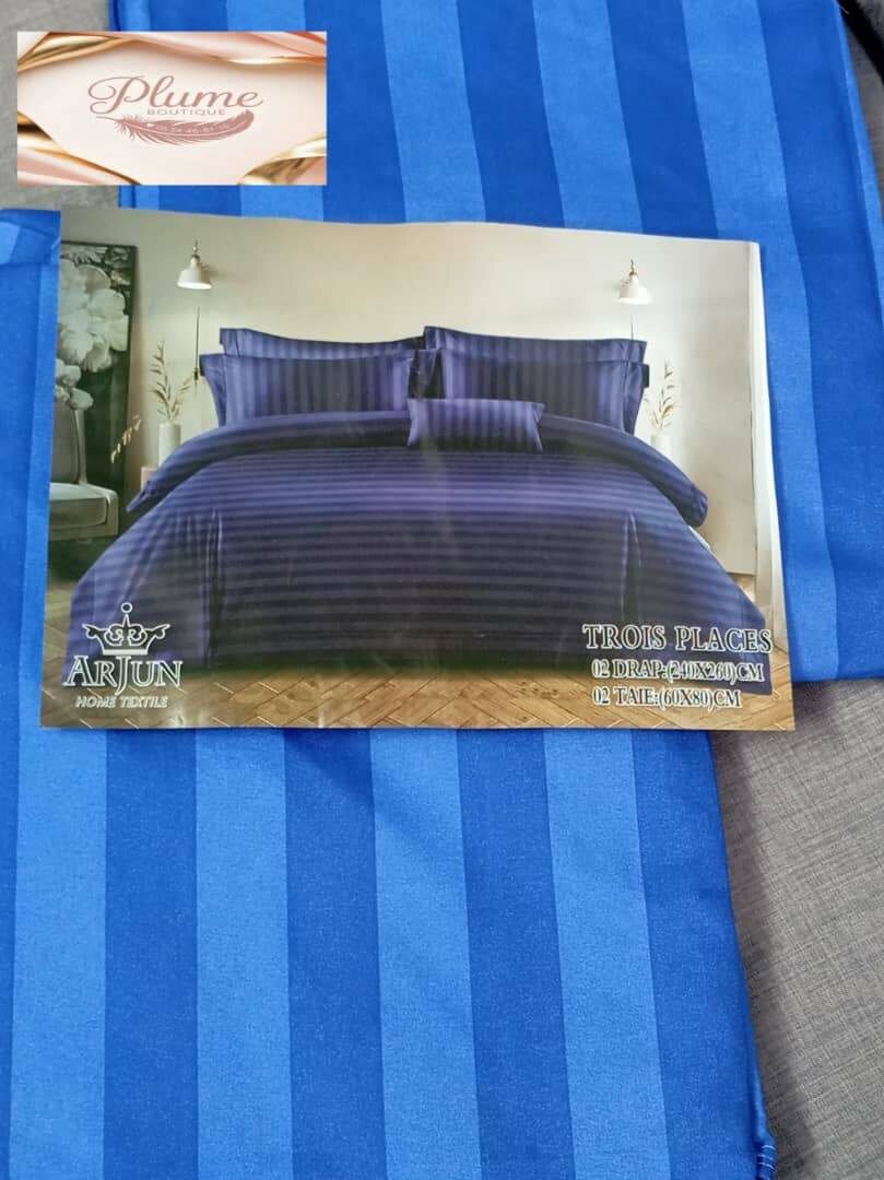 2 draps et 2 taies d'oreillers