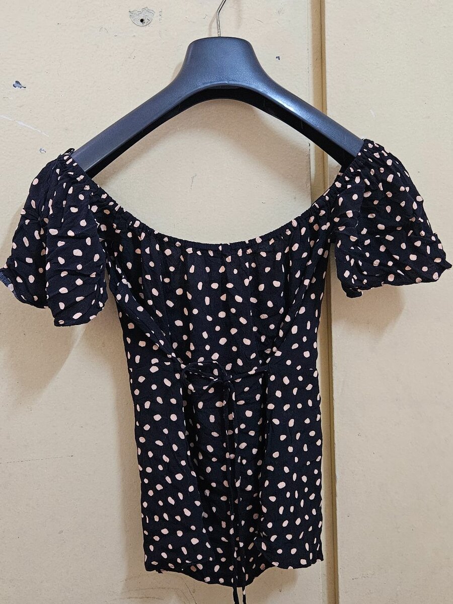 Top femme à pois élégante