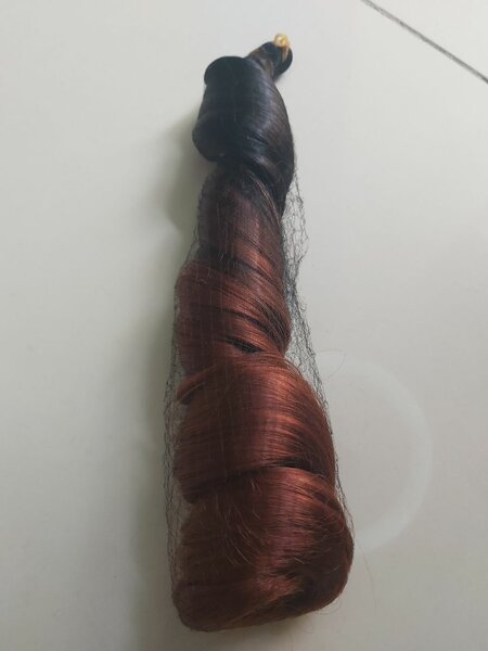 Extensions cheveux bouclés