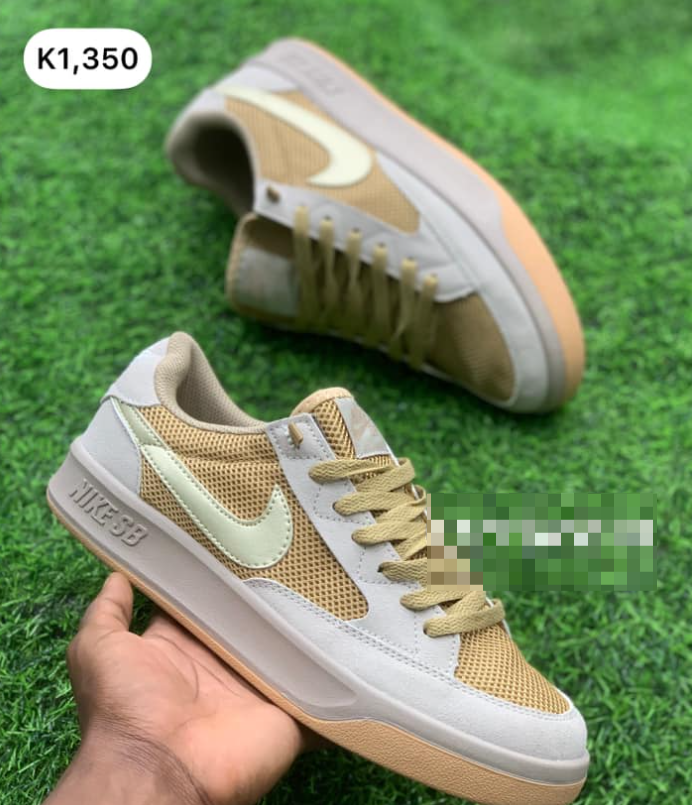 beige and white sneakers with mesh