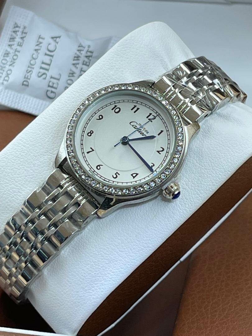 Montre  FEMME  ROLEX / CARTIER