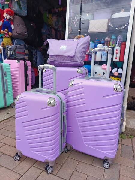 Valises rigides violettes