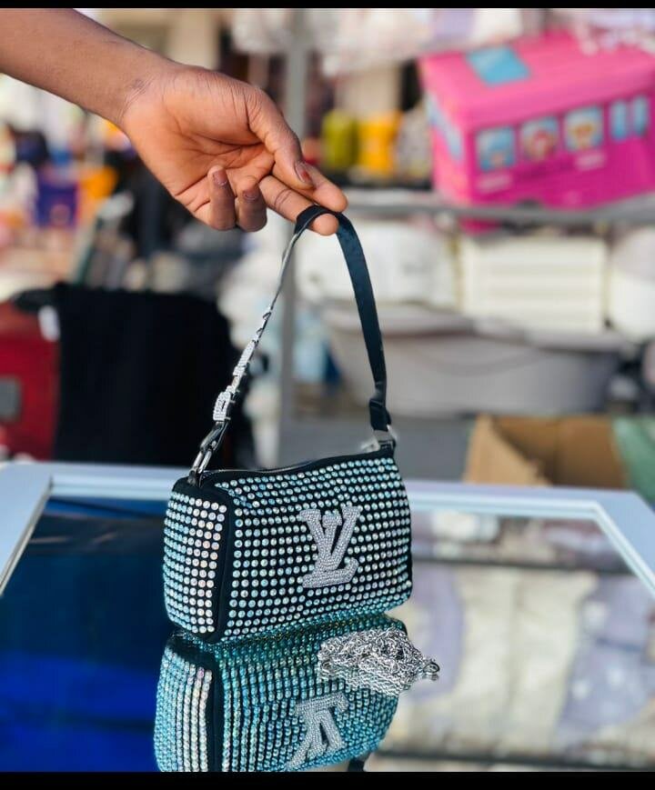 Shiny channel purses