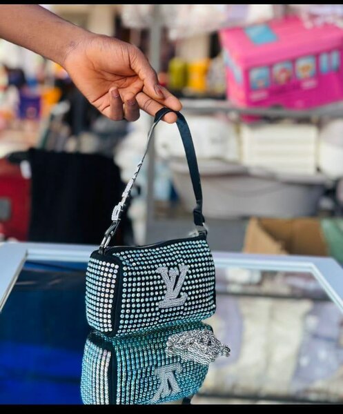 Shiny channel purses