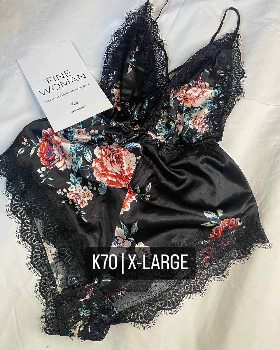 Beautiful women's bodysuit with floral print for sleeping