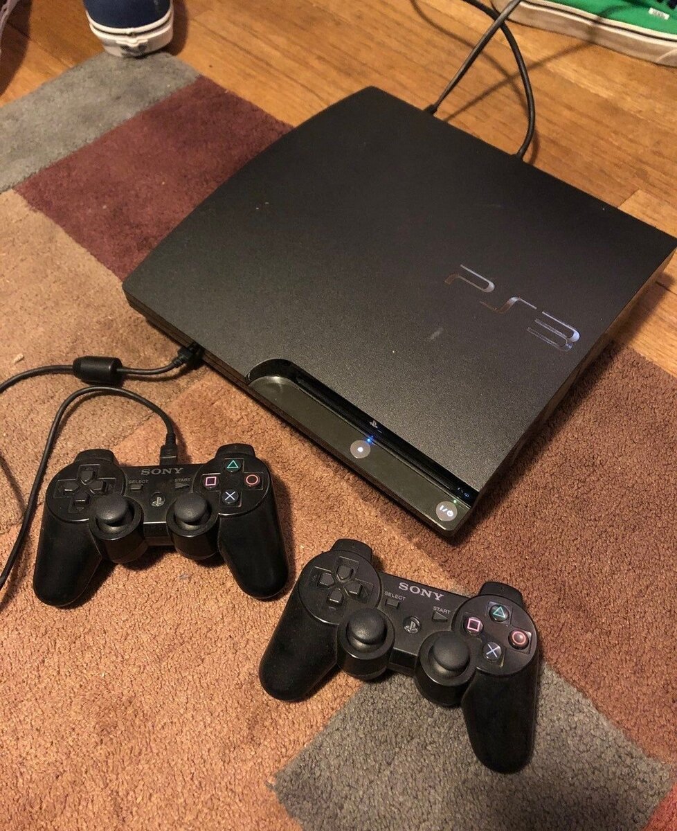Sony PS3 Slim avec Manettes