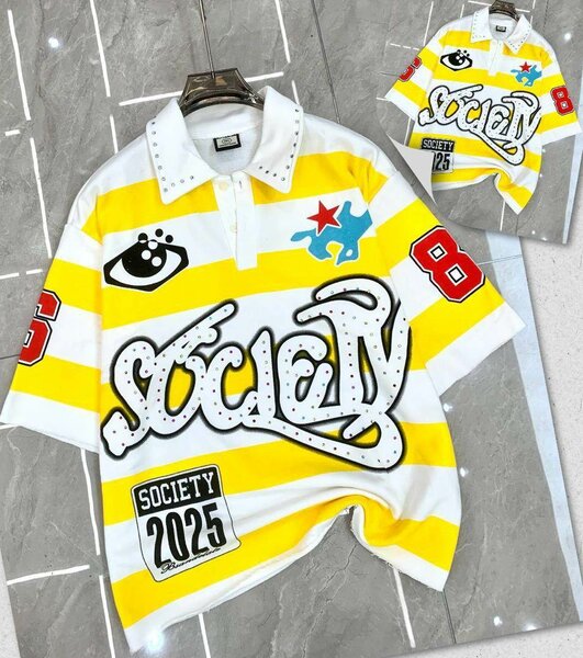 Polo rayé graphique tendance