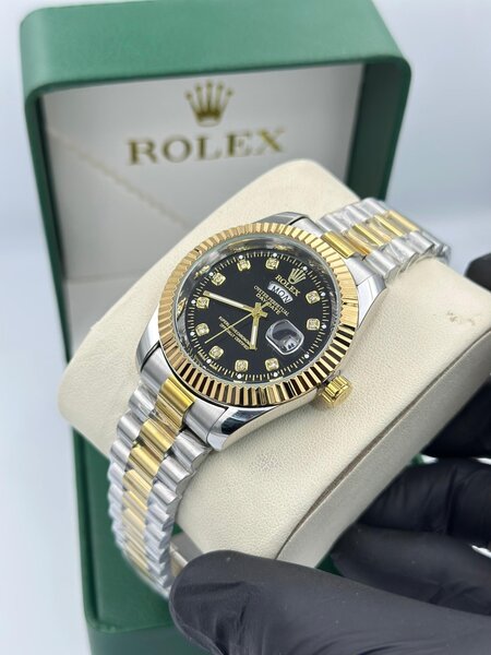Montre Rolex élégante bicolore