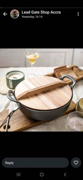 Wok with wooden cover