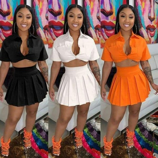 Costume consists of top and mini skirt in 3 colors:black,white and orange