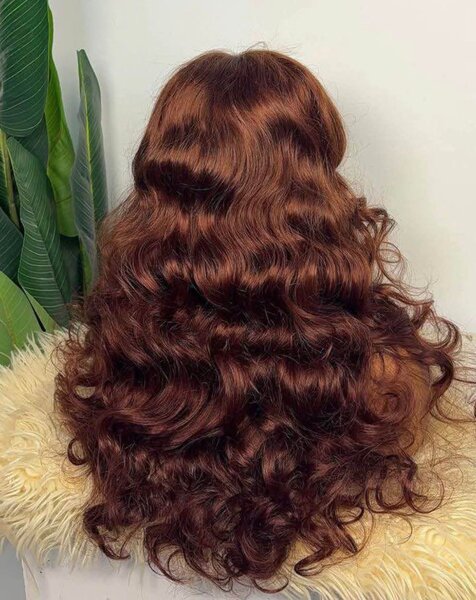 Perruque longue bouclée rousse