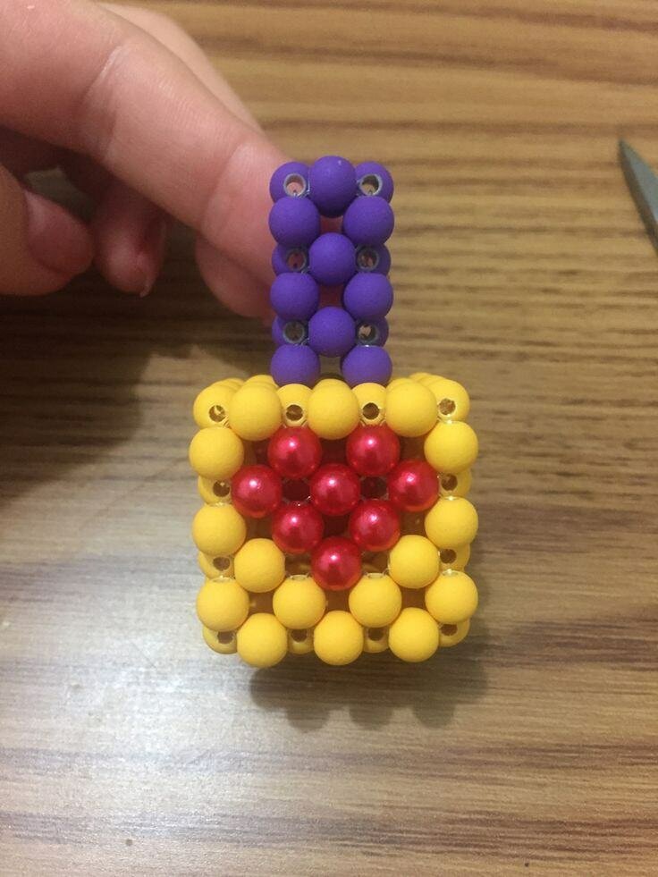 Porte-clés perle pot de vernis