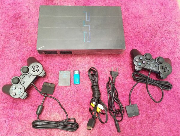 PS2 craqué avec 20 jeux et 2 manettes