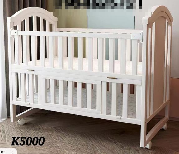 white baby cot