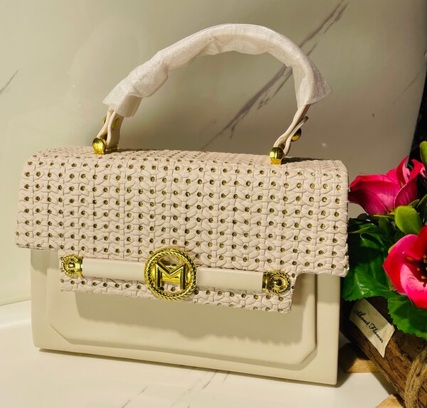 Sac à main élégant tressé