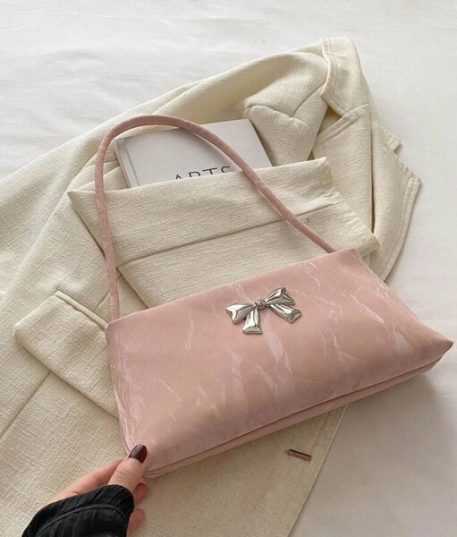 Sac à main rose avec nœud