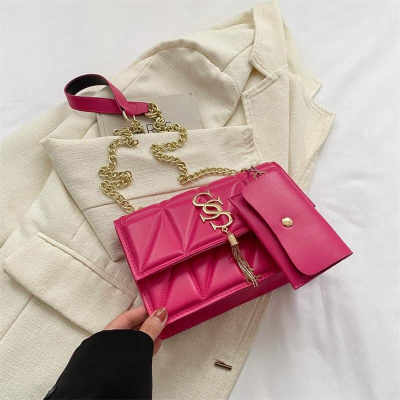 High-quality, stylish women's pink bag with an accessory