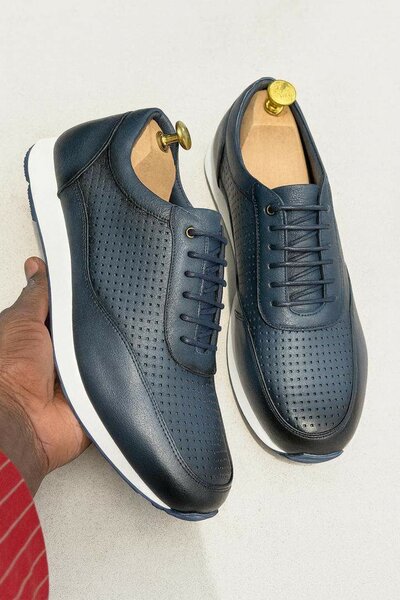 Chaussures de ville en cuir perforé