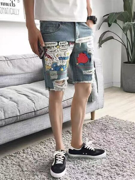 Shorts en jean avec motifs BD
