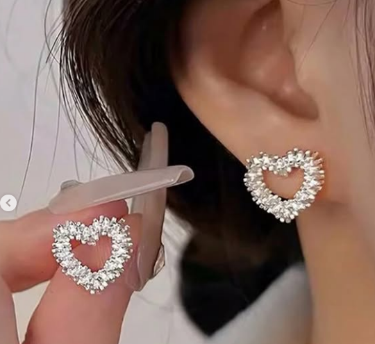 Beautiful fashionable earrings heart shaped