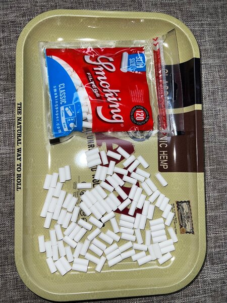 Rolling paper tip / filter