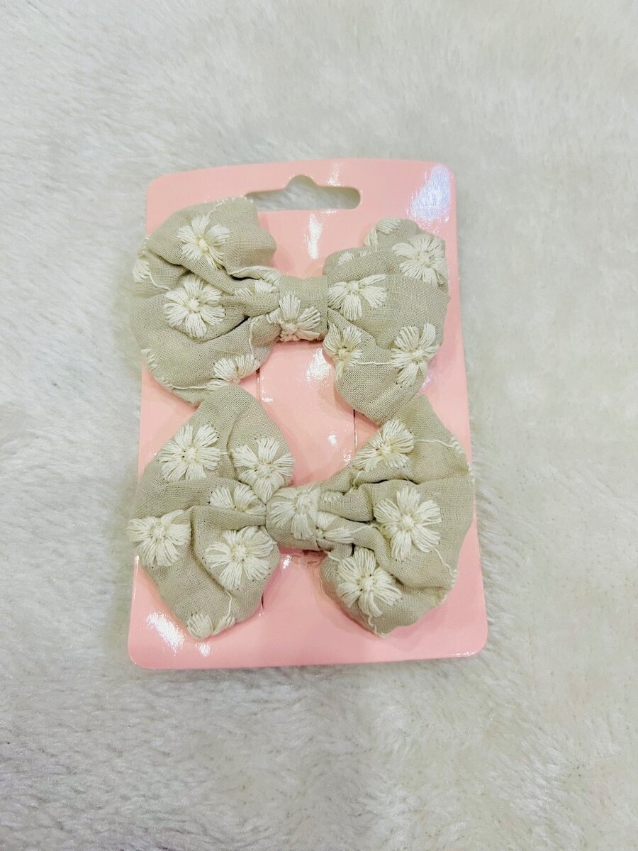 Skin color embroidery hair pins for kids pair.