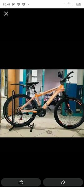 Vélo urbain femme orange