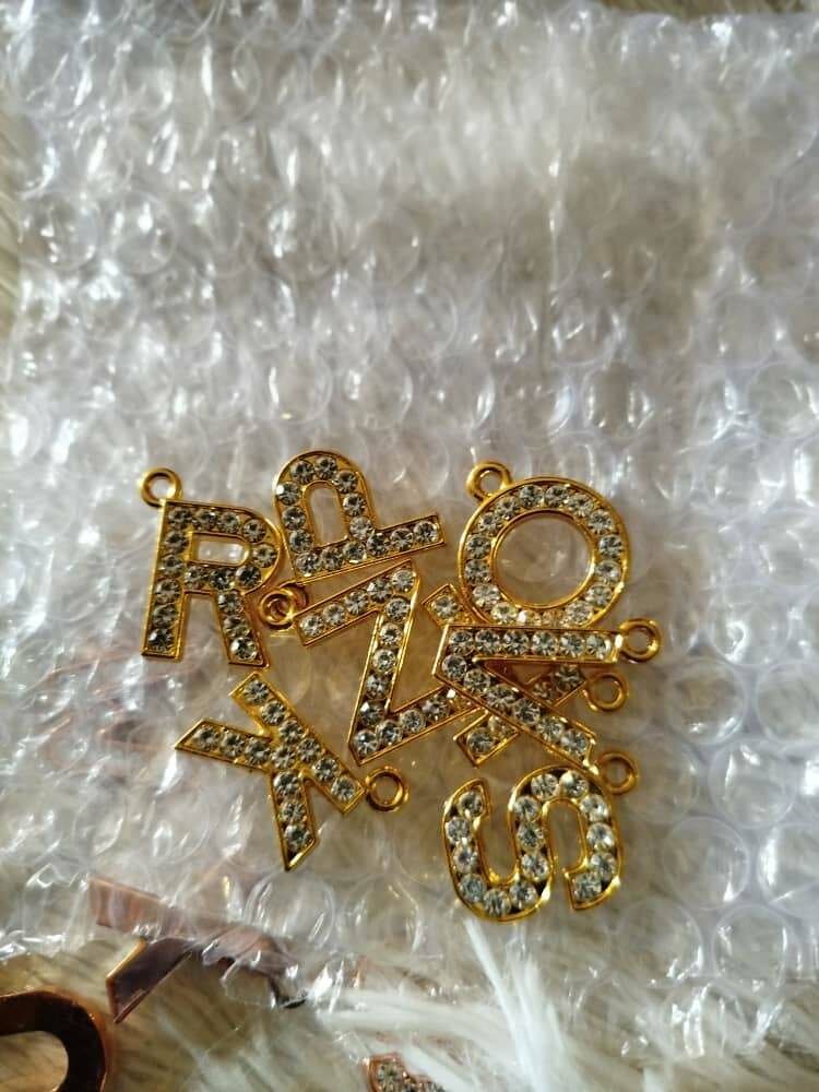 Médailles avec initial nom