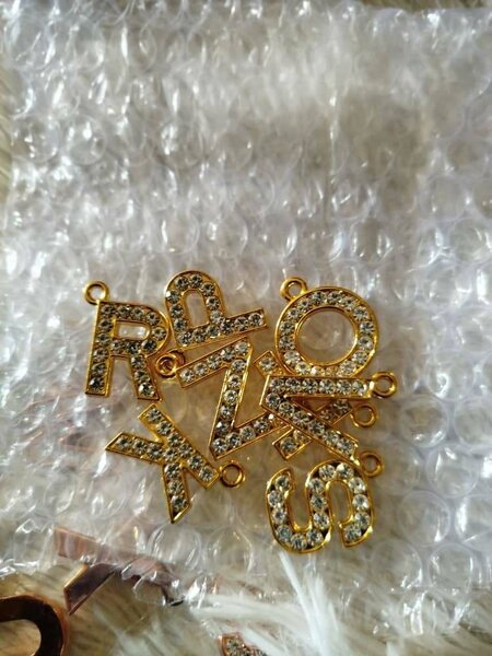 Médailles avec initial nom