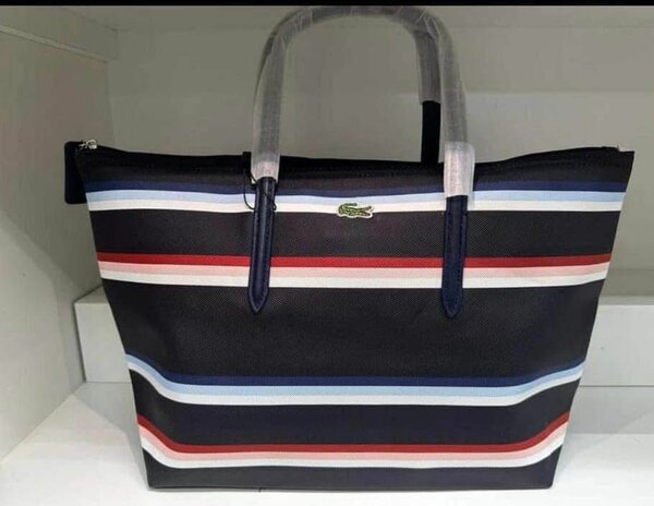 Sac Lacoste élégant à rayures