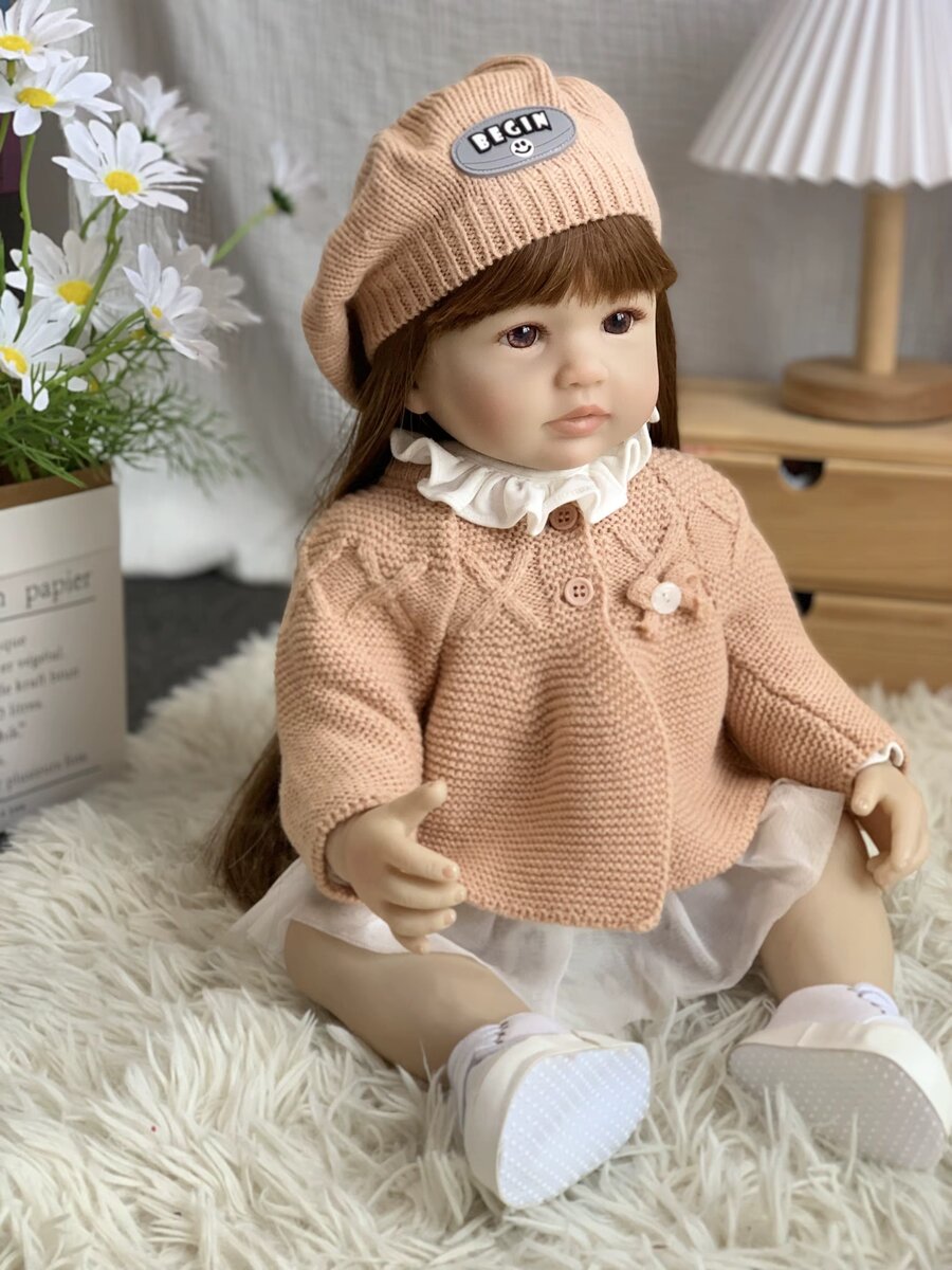 Poupée réaliste en tricot