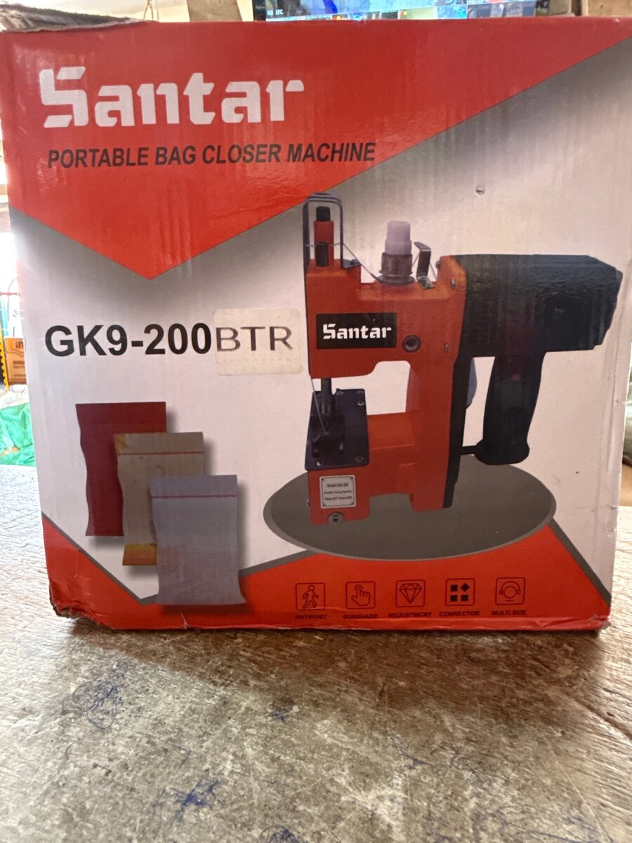 Portable sack sewing machine