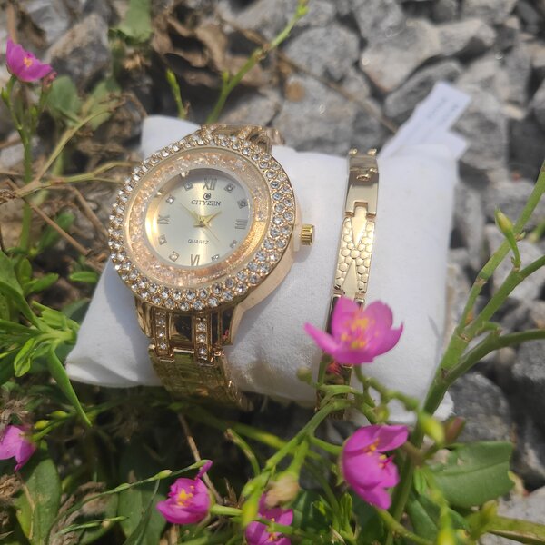 Gold watch with bracelet