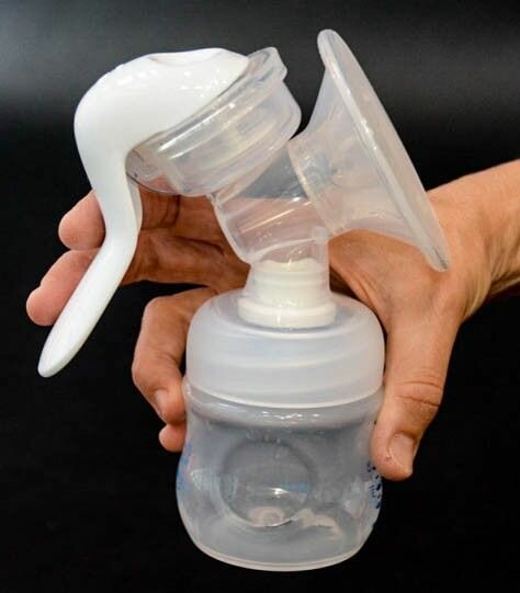 Tire-lait manuel pratique