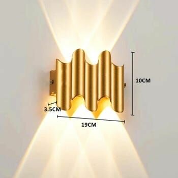 Applique murale métallique dorée