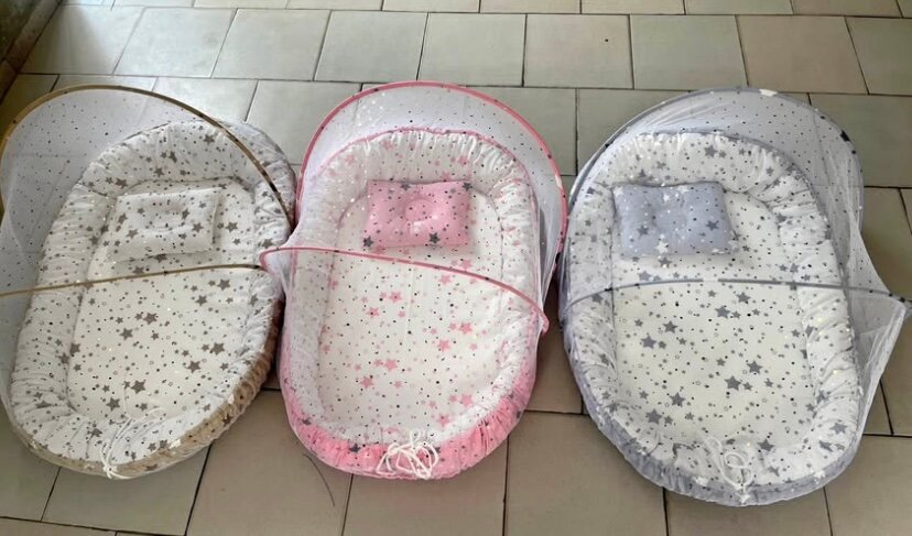 Nid pour bébé avec moustiquaire